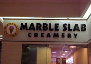 Sign installation Metairie for local Marble Slab Creamery store